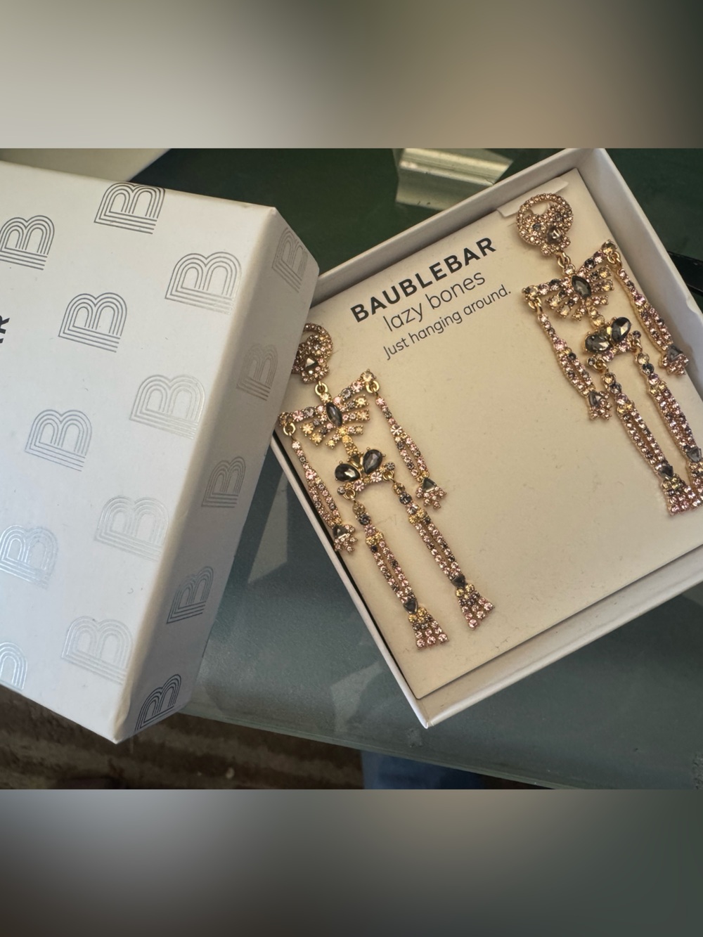 BaubleBar Rose Gold & clear w/ touches of black Crystal FUN skeleton earrings